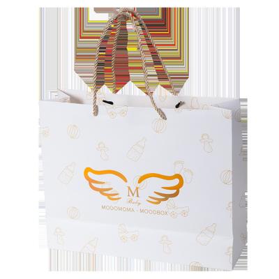 China Recyclable Custom White Gold Foil Paper Cardboard Gift Bag Touch Lamination Cardboard Packaging Bags for sale