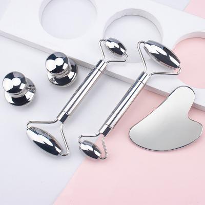 China Metal handheld natural massager double roller stainless steel gua roller gua sha tool facial product for sale