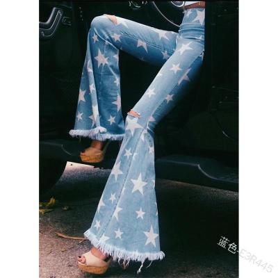 China Breathable new European and American with holeswomen's star and denim print bell bottom pants for sale