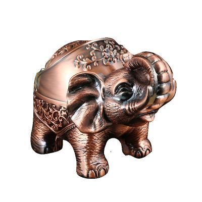 China Thai metal ashtray elephant pattern ashtray metal with high quality indoor multifunctional cute ashtray smokeless seal windproof cover the retro for sale