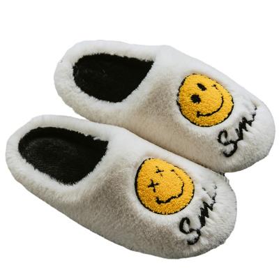 China CUSHIONING 2021 Winter Indoor Women's Slippers Faux Fur Home Fluffy Smile Face Slippers For Women for sale