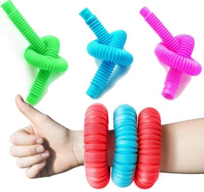 China Funny Educational Toy Cheap Fidgeting Game Kill Time Sensory Toys Fun Jump Tubes For Kids Stretch for sale