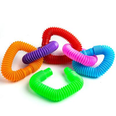 China Toy Wholesale Colorful Diy Building funny educational plastic fidgety person sensory tools pop up tubes whistle sensory toys for kids stretch for sale