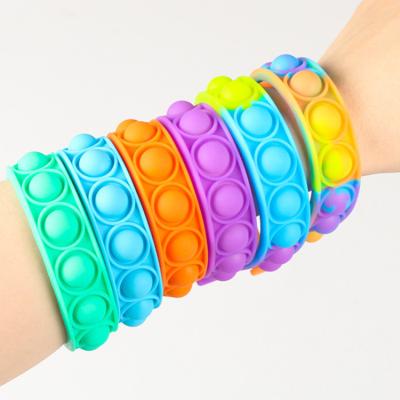 China Rainbow Fun Decoration Silicone Rainbow Kid Band Watch Strap Push Bubble 6pcs Snap Popper Sensory Toys Pack Wristband for sale