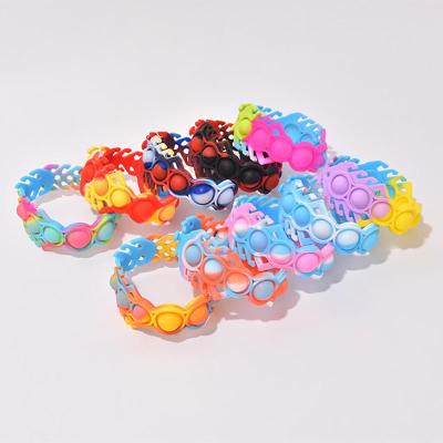 China Children's Toys Rainbow Bubble Squeeze Wristband Relaxing Toy Press Decompression Toys Hand Shaking Person Toys Soft Silicone Band for sale