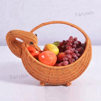 China Hotel Duck Shaped Decor Handle Rattan Sustainable Portable Home Fruit Basket for sale