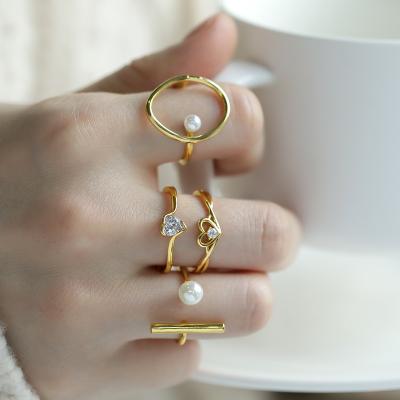 China Girl's Heart Ring Combination Korean Pearl Stainless Steel Zircon Minimalist Gold Plated Minimalist Ring for sale