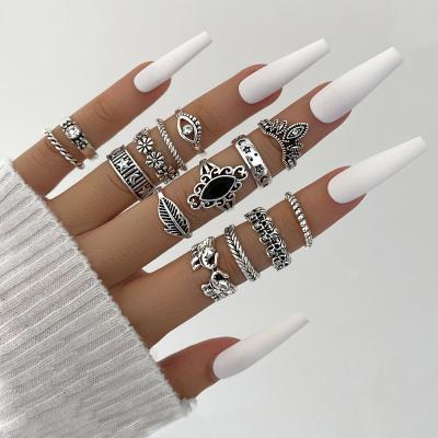 China CLASSIC Personalized Black 14pcs/set Diamond Embossed Elephant Skull Star Moon Joint Flower Ring Set for sale