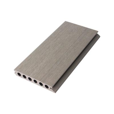 China New waterproof low price 3d wood grain co-extrusion wpc decking for sale