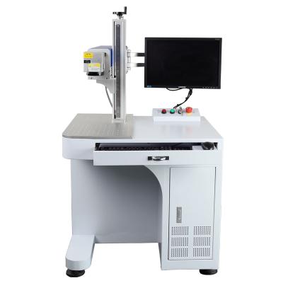 China Best Laser Marking Machine CO2 Spotting Laser Engraving Machine Spotting Laser Printing On Metal Factory Price Marking For Leather 50w 100w for sale