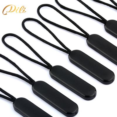 China Nickel Free Zipper Pulls Manufacturer Logo Wholesale Customized PVC Zipper Puller For Clothing Zipper Tags For Bags for sale