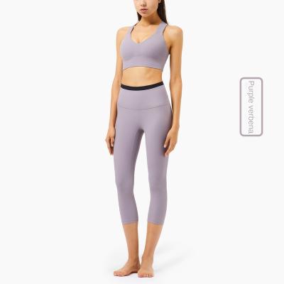 China QUICK DRY beauty rib beauty yoga wear European and American women's cross back underwear suit women's high waist hip lift cropped sports pants for sale