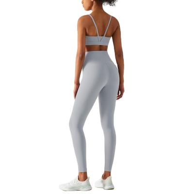 China New read 2022 QUICK DRY yoga suit for women AD series workout beauty back bra hip lifting tights for sale