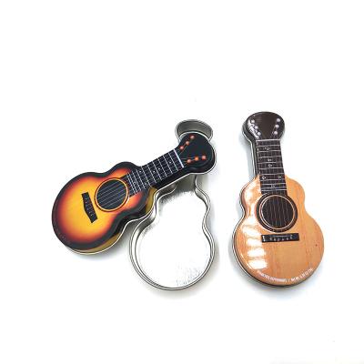 China Recyclable Custom Funny Mint Theme Music Metal Tin Box Guitar Shape Mint Promotional Candy Tin Festival Festival for sale