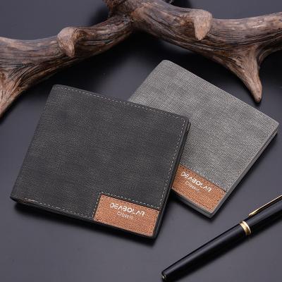 China Japanese and Korean ultra thin horizontal wallet of new wallet youth retro waterproof short wallet for sale