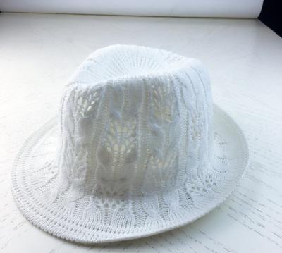 China Breathable 2023 Wholesale Spring and Autumn Knitted Top Hat Retro Hollow Flapped Jazz Hat for sale