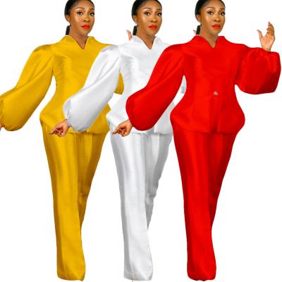 China Anti-static Tianbao Europe and the United States women's fashion suit color bubble sheer sleeve jacket wide leg pants two sets for sale