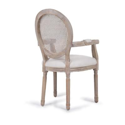 China Modern High Quality Modern Rattan Canvas Fabric Back Luxury Elegant Wooden Arm Dining Chairs for sale