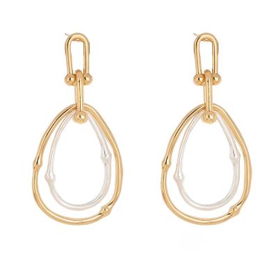 China FASHIONABLE personality of 2021 new earrings exaggerated simple two-tone earrings metal drop earrings for sale