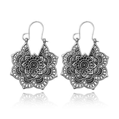 China Hot Selling Vintage Fahsion Bohemia Retro Antique Silver Cavity Flower Circle Gypsy Earrings For Women for sale