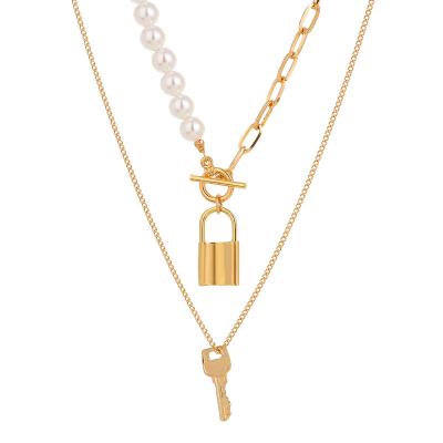 China Gold Plated Pearl Chain Necklace Trendy Fashion Key Lock Heart Pendant Necklace For Women for sale