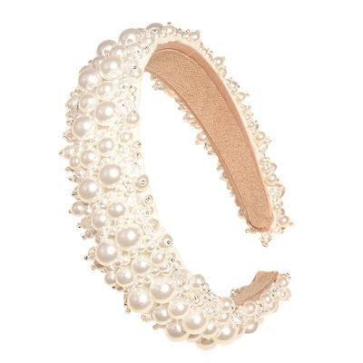 China Hot Selling Hair Material Friendly Full Material Baroque Bridal Headband Pearl Headband Padded Hair Accessories For Women for sale