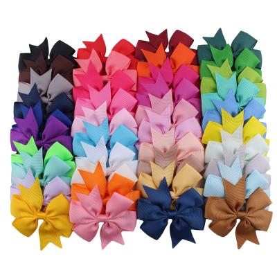 China Trendy Wholesale Fashion Kids Hair Bows Grosgrain Ribbon Bowknot Hair Clips For Teens Children for sale