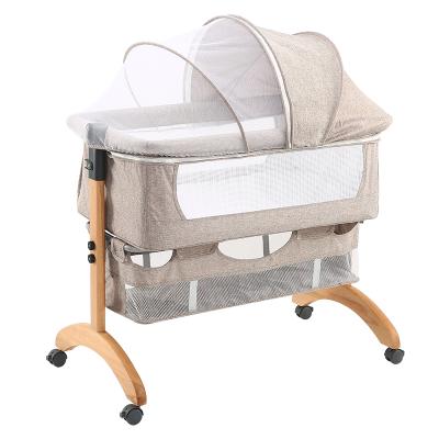 China Simple Comfortable Bedside Baby Cot Fashion Crib Baby Bed for sale