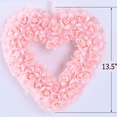 China Wedding Decoration Wedding Supplies Decor Wedding Favors Artificial Moss Rose Flowers Heart Shaped Garland For Wall Decor for sale