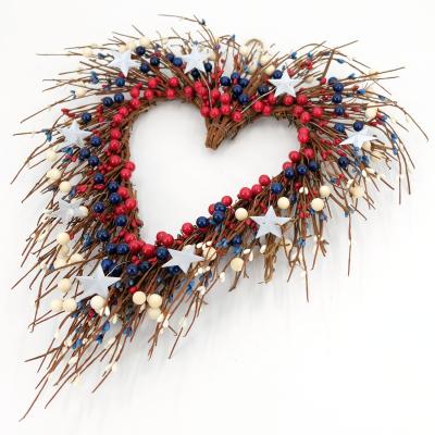 China Outdoor indoor decoration patriotic garland in heart shape with blue red white berries and stars for patriotic decorations for sale