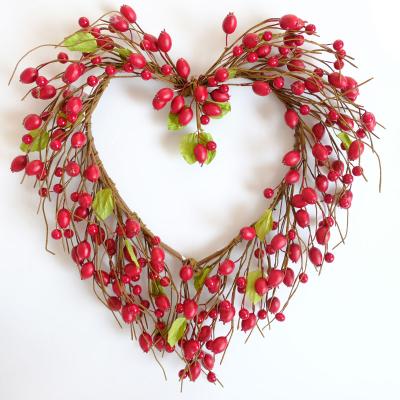 China 2022 New Design Valentine's Day Outdoor Indoor Decorations Heart Shaped Garland with Big Red Berries for Front Entrance Decor for sale