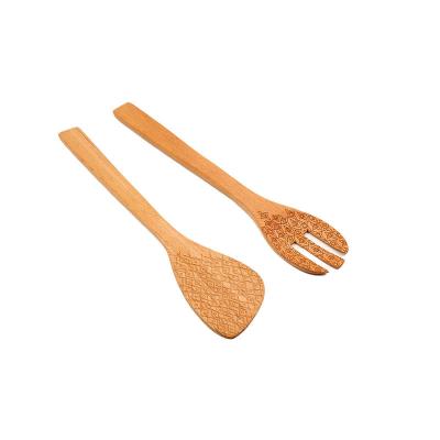 China Sustainable kitchen utensils long handle engraved wooden spoon mixing salad servers kitchen tool for sale