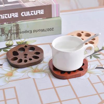 China Sustainable Beech Wood Tray Lotus Wooden Coasters Handmade Wood Tray Lotus Root Shape Cup Mat Coasters for sale