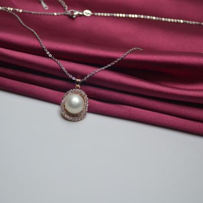 China Large Design Pearl Pendant Charm Creative Wholesale Cute Curvy Cage Pendant Necklace for sale