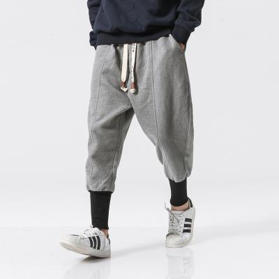 China Anti-wrinkle High Quality Cotton Harem Pants Men Solid Elastic Waist Streetwear Joggers New Baggy Drop-crotch Men's Pants Casual Trousers for sale