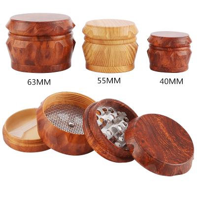 China Zinc Alloy Tobacco Grinder 40mm/55mm/63mm Metal Teeth CNC Tobacco Grinder 4 Layers Drum Shape Wood Grinder With Zinc Alloy Tooth for sale