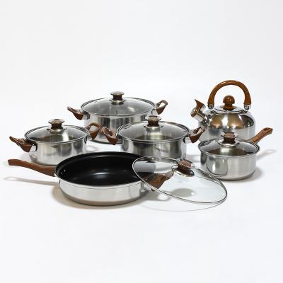 China Non stick sustainable cookware set 12 pcs set pot wood grain handle with kettle pot kitchen cooking pot set for sale