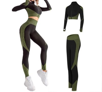 China Breathable Women Sports Fitness Equipment Set Workout Yoga Suit Long Sleeve Zipper Crop Tops Gaiters Seamless Yoga Suits 2 Piece Set for sale