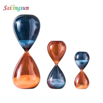 China Food Grade Safe Classic Colorful Design High Clear Pyrex Table Glass Hourglass for sale