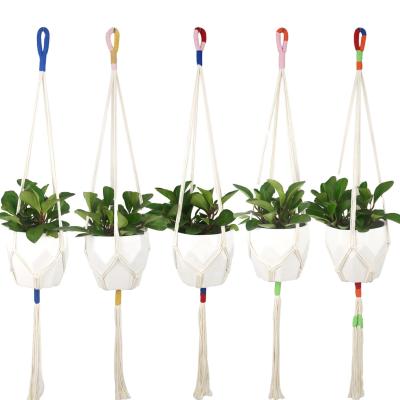 China Creative Handmade Wholesale Home Decoration Cotton Rope Macrame Plant Hanging Plastic Hangers Indoor Decor for sale