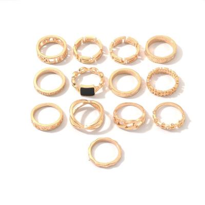 China FASHIONABLE European and American punk wind personality zinc alloy ring 13 piece set drop oil letters star black ring jewelry manufact for sale