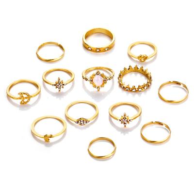 China TRENDY Retro Alloy Joint Ring Set With 13 Fishtail Knots For Women Gold Plated Opp Bag Gemstone Rings Zircon Ring Designs Latest NC; ZHE for sale