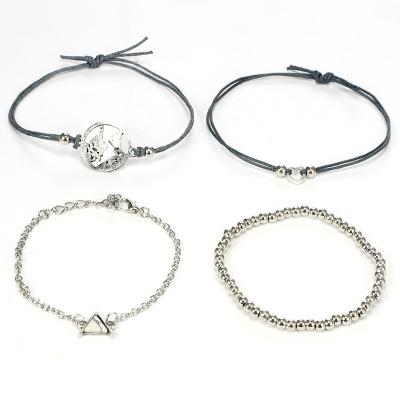 China Bohemian fashion woven map love triangle pine stone rice bead trend 4 pieces bracelet for sale