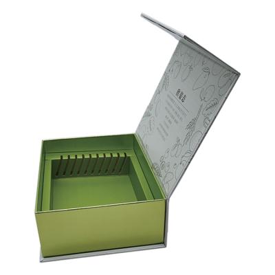 China Biodegradable Customized Magnetic Book Style Cosmetic Box Paper Design Packaging Box With Insert for sale