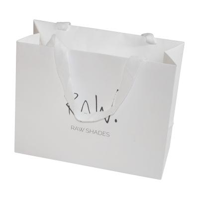 China Biodegradable Wholesale Custom Logo Paper Bag Luxury Printed Gold Stamping Gift Paper White Shopping Bags for sale