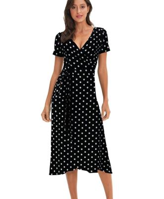 China Polka Dot Casual Long Dress V-Neck Anti-Static Short Sheath Floral Beach Dresses for sale