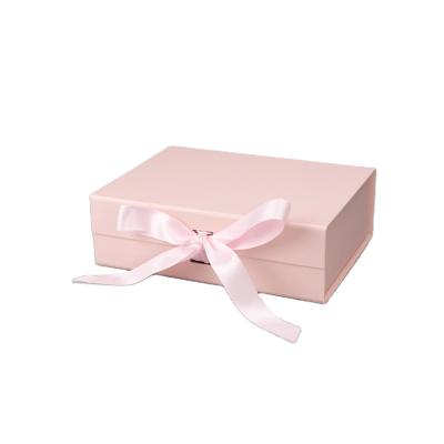 China Recycled Materials Cardboard Luxury Foldable Magnetic Cosmetic Clothes Boxes Custom Pink Paper Gift Box Packaging With Logo for sale