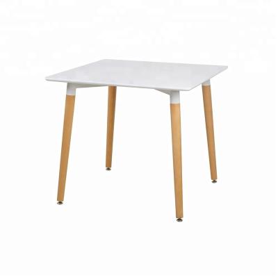 China Modern Convertible Dining Table White Wood Desk Dining Table With Solid Wood Legs for sale