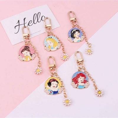 China New Simulation Doll Toys Cartoon Frozen Princess Dripping Alloy Snow White Keychain Babies Flower Bag Key Chain Pendant Toys for sale