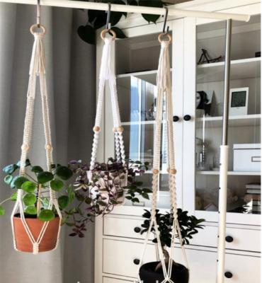 China Simple Design 2021Fashionable Good Quality Cotton Macrame Plant Choose INS Hangers Modern Macrame Rope Potted Plant Rack for sale